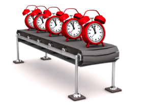 Clocks On Conveyor Belt